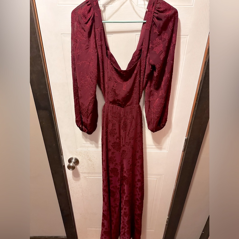 Brand new open back jumpsuit.